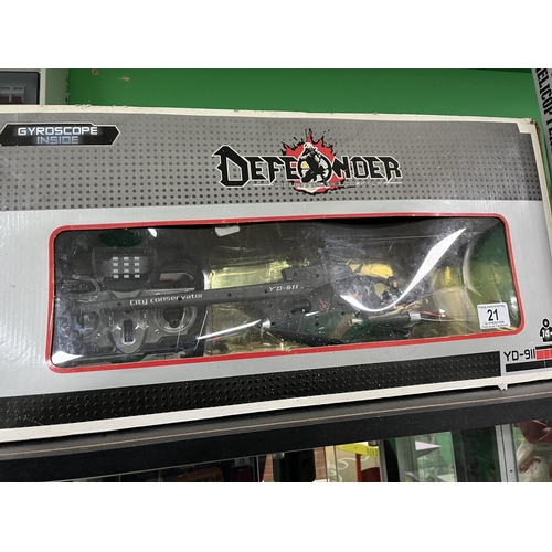 21 - DEFENDER 3 CHANNEL HELICOPTER REMOTE CONTROL IN THE BOX