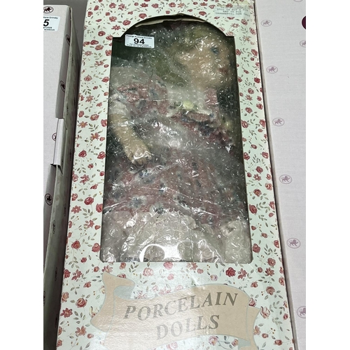 94 - PORCELAIN DOLL BOXED