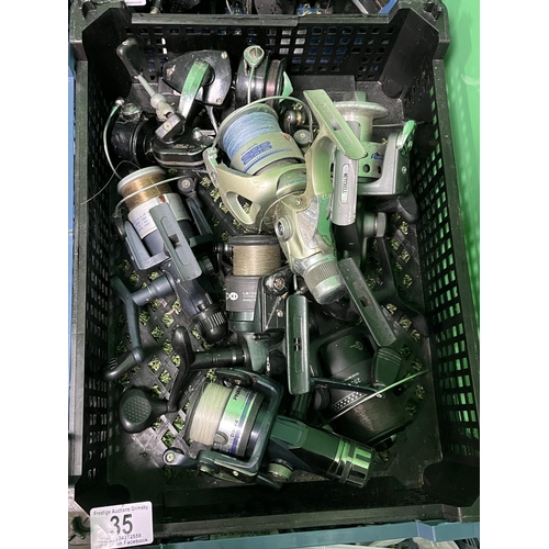 35 - BASKET OF FISHING REELS