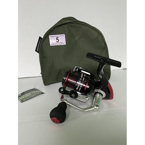 5 - SHARKY 11 4000 FISHING REEL IN A BAG