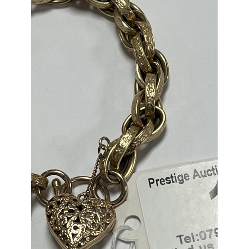 1 - 9CT GOLD TRIPLE LINKED SCROLLED PATTERN BELCHER BRACELET WITH HEART CLASP 7” 19.63 GRAMS