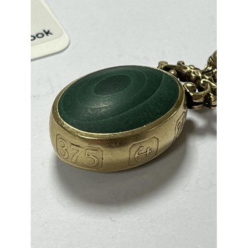 100 - OVERSIZED FOB WHICH COULD BE USED AS A PENDANTWITH STUNNING HALLMARKS FOR 9CT GOLD. MEASURES APPROX ... 