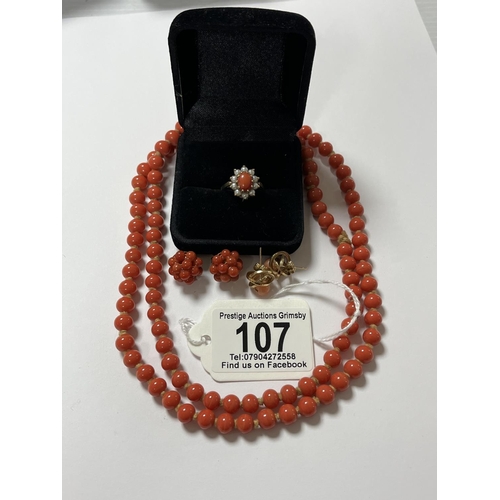 107 - STUNNING COLLECTION OF CORAL JEWELLERY INCLUDES: 28” NECKLACE, 2 PAIRS OF EARRINGS AND A 9CT GOLD RI... 