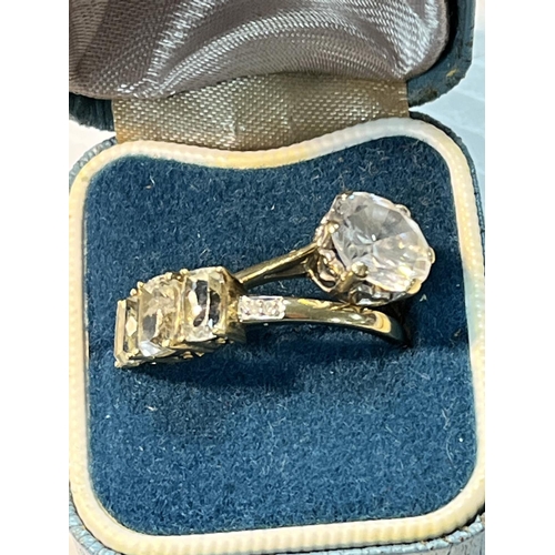 109 - 9CT GOLD RING WITH SMALL SIDE DIAMONDS AND LARGE CLEAR STONES SIZE S 2.4 GRAMS AND A 9CT GOLD RING S... 