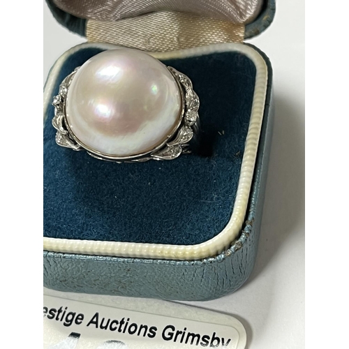 123 - MAYBE PEARL & DIAMOND RING IN WHITE METAL SIZE K 7.78 GRAMS TOTAL WEIGHT