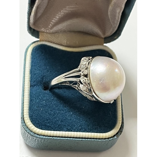 123 - MAYBE PEARL & DIAMOND RING IN WHITE METAL SIZE K 7.78 GRAMS TOTAL WEIGHT