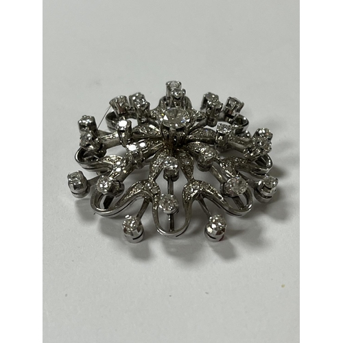 208 - STUNNING 18CT WHITE GOLD DIAMOND SNOWFLAKE BROOCH WITH 65 DIAMONDS RANGING FROM A NICE SIZE IN THE C... 