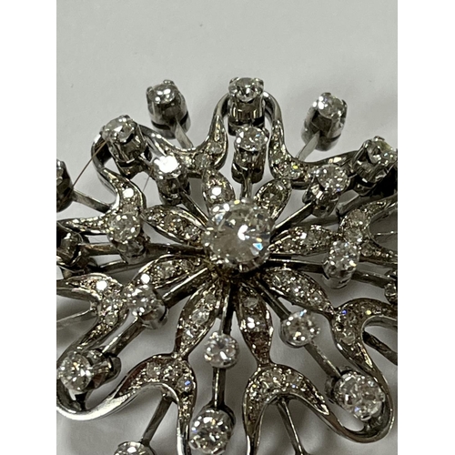 208 - STUNNING 18CT WHITE GOLD DIAMOND SNOWFLAKE BROOCH WITH 65 DIAMONDS RANGING FROM A NICE SIZE IN THE C... 