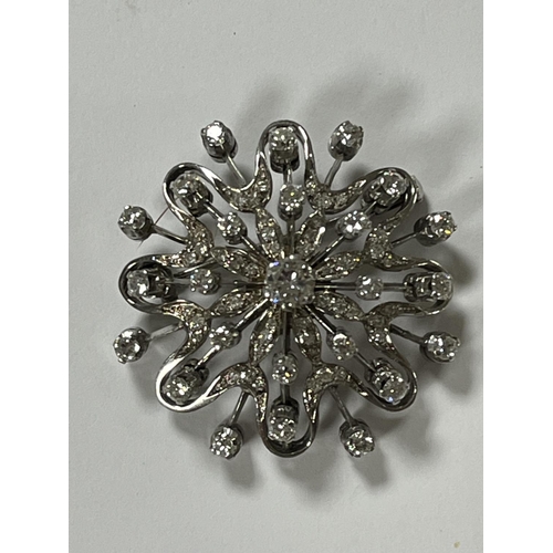 208 - STUNNING 18CT WHITE GOLD DIAMOND SNOWFLAKE BROOCH WITH 65 DIAMONDS RANGING FROM A NICE SIZE IN THE C... 