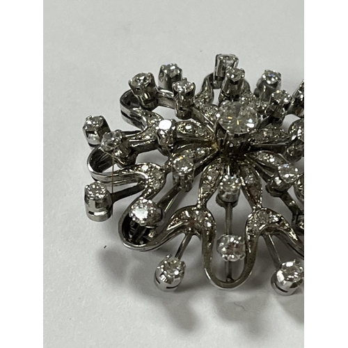 208 - STUNNING 18CT WHITE GOLD DIAMOND SNOWFLAKE BROOCH WITH 65 DIAMONDS RANGING FROM A NICE SIZE IN THE C... 