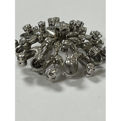 208 - STUNNING 18CT WHITE GOLD DIAMOND SNOWFLAKE BROOCH WITH 65 DIAMONDS RANGING FROM A NICE SIZE IN THE C... 