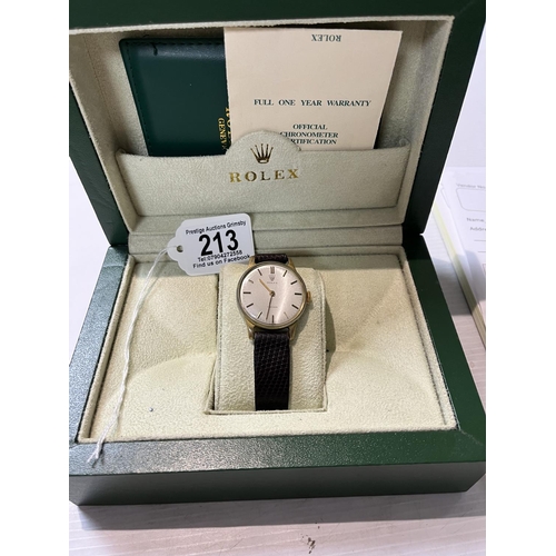 213 - ROLEX WATCH IN A BOX THIS WATCH IS AN OLDER DESIGN AND LOOKS TO HAVE HAD A REPLACEMENT BACK. POSSIBL... 