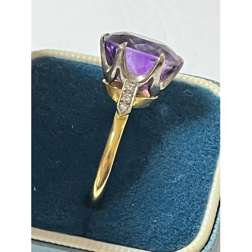 51 - 18CT GOLD RING WITH LARGE AMETHYST & 6 SMALL SHOULDER DIAMONDS SIZE V WEIGHS 6.53 GRAMS