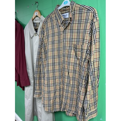 59 - BURBERRY SHIRTS X2 RED SHIRT IS A LARGE THE CHECK SHIRT IS A MEDIUM ALSO A BURBERRY TRENCH COAT WHIC... 