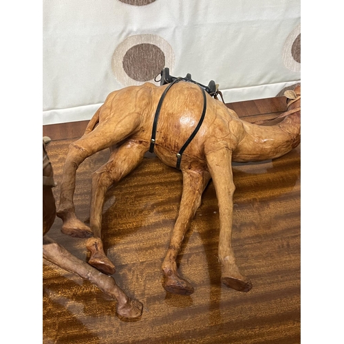 61 - 3 VINTAGE LEATHER COVERED CAMELS THE LARGES IS 40CM WIDE AND ONE OF THE CAMELS IS A/F