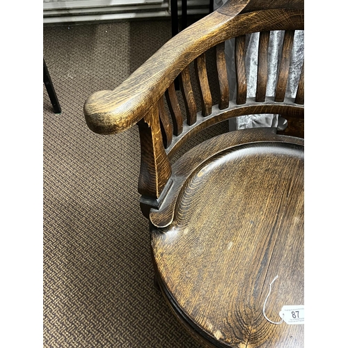 87 - GOOD QUALITY ANTIQUE SOLID WOOD REVOLVING DESK CHAIR RAISED BACK WITH SHAPED SPINDLES