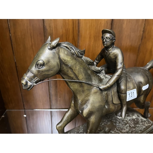 131 - MISSING ORIGINAL BASE BUT A NICE EXAMPLE OF A BRONZE RACE HORSE WITH JOCKEY APPROX 38CM HIGH BY 52CM... 