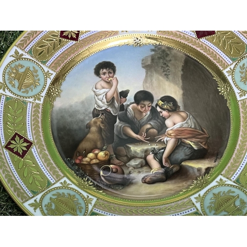 87 - ROSENTHAL PLATE WITH A SCENE OF CHILDREN PLAYING DICE THE BACK ENTITLED WURFELSPIELER AFTER MURILLO,... 