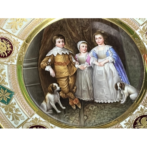 88 - ROSENTHAL PLATE DECORATED IN VIENNA STYLE WITH THE CENTRE SHOWING 3 CHILDREN AND THEIR DOGS ENTITLED... 