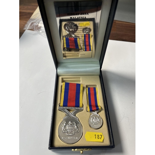 187 - 2 X MALAYSIAN MEDALS