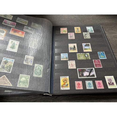 19 - STAMP ALBUM FULL OF TREE STAMPS