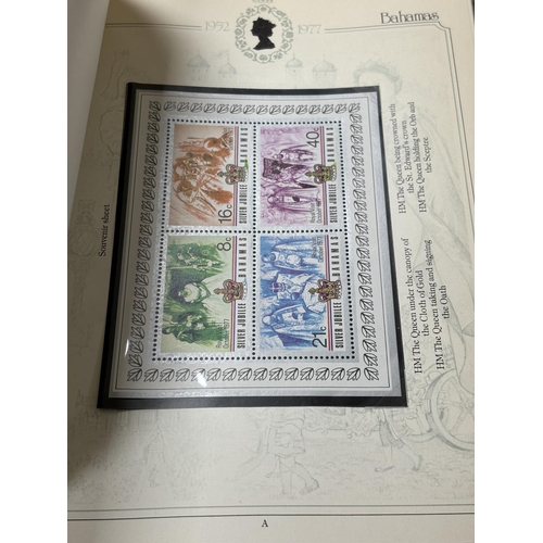 67 - SILVER JUBILEE COMMEMORATIVEVALBUM OF MINT CONDITION STAMPS AND STAMP BOOKS OF THE COMMONWEALTH