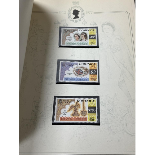 67 - SILVER JUBILEE COMMEMORATIVEVALBUM OF MINT CONDITION STAMPS AND STAMP BOOKS OF THE COMMONWEALTH