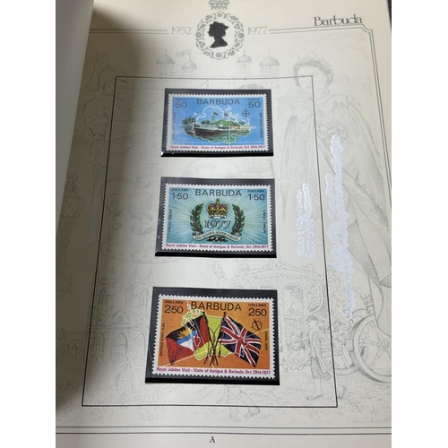 67 - SILVER JUBILEE COMMEMORATIVEVALBUM OF MINT CONDITION STAMPS AND STAMP BOOKS OF THE COMMONWEALTH