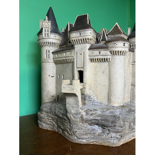 52 - REALLY HEAVY POT CASTLE APPROX 38CM TALL