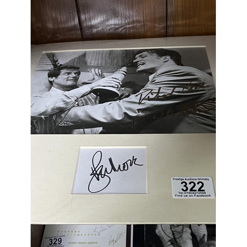 322 - SIGNED JAMES BOND PICTURE WHEN BIDDING ON THIS LOT PLEASE SEE THE PHOTOS FOR YOUR OWN REASSURANCE