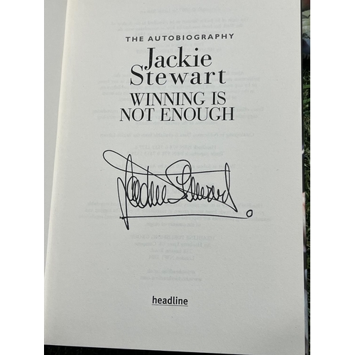 342 - SIGNED JACKIE STEWART BOOK WHEN BIDDING ON THIS LOT PLEASE SEE THE PHOTOS FOR YOUR OWN REASSURANCE