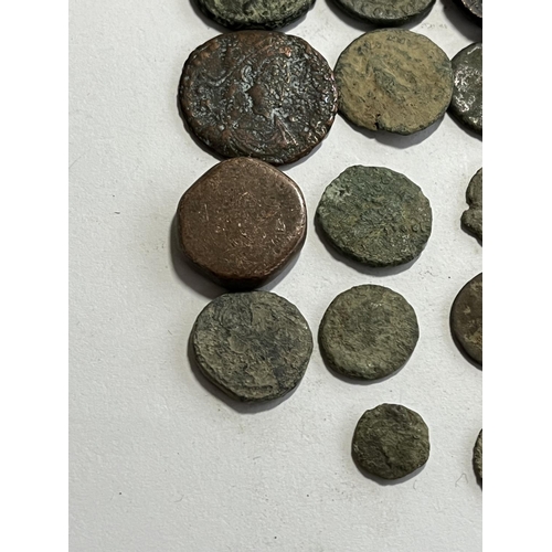 119 - 22 POSSIBLY ROMAN? COINS (PLEASE SEE PICTURES)