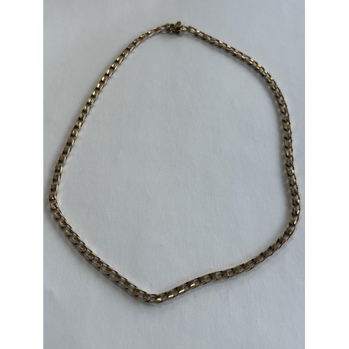 27 - HEAVY 9CT GOLD CURB NECKLACE 18