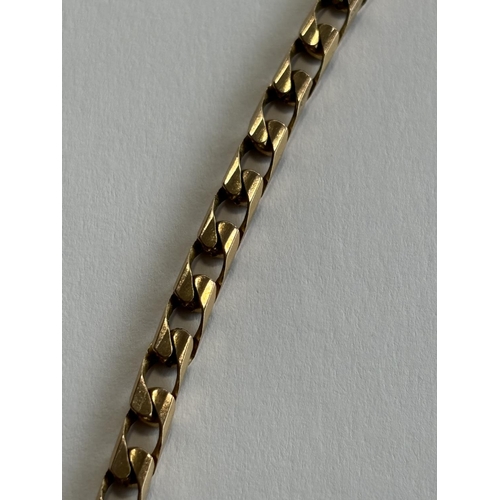 27 - HEAVY 9CT GOLD CURB NECKLACE 18