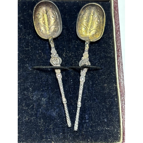 301 - SILVER ANNOINTING SPOONS IN AN OLD CASE