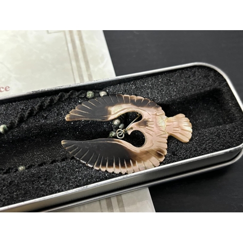 21 - ELVIS PRESLEY'S EAGLE SHELL & LEATHER OWNED NECKLACE. THIS GENUINE AND ONE OF A KIND EAGLE NECKLACE ... 