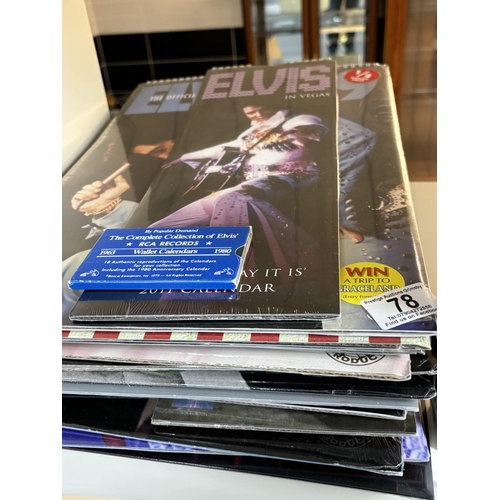 78 - APPROXIMATELY 23 SEALED ELVIS CALENDARS WITH A RCA WALLET CALENDARS PRODUCED BY BOX CAR ENTERPRISES