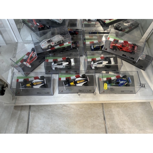 433 - SHELF OF RACING CARS FORMULA 1 BOXED APPROX  11 PLEASE SEE PICTURES FOR CONTENT