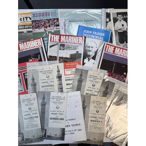 45 - PILE OF GRIMSBY TOWN RELATED FOOTBALL PROGRAMMES SPANNING SEVERAL DECADES