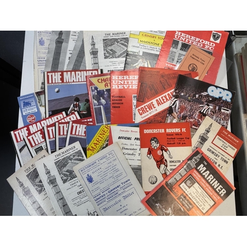 45 - PILE OF GRIMSBY TOWN RELATED FOOTBALL PROGRAMMES SPANNING SEVERAL DECADES