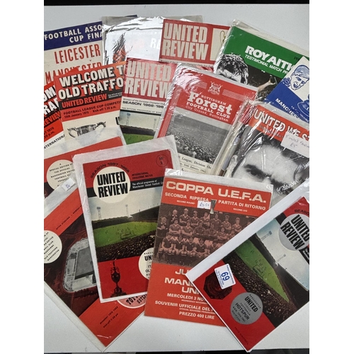 69 - PILE OF MANCHESTER UNITED FOOTBALL PROGRAMMES