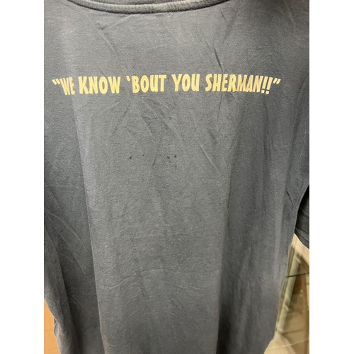 197 - WE KNOW ABOUT YOU SHERMAN SIZE LARGE ORIGINAL T-SHIRT BOUGHT AT THE MUSIC/TOUR VENUE PLEASE SEE PICT... 