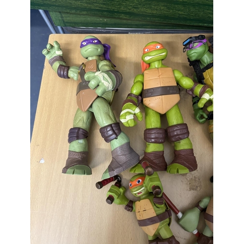 169 - BOX OF TEENAGE MUTANT NINJA TURTLES INCLUDES A VEHICLE, ROCK STEADY & TURTLES PLEASE SEE PICTURES FO... 