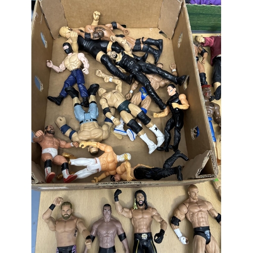 173 - BOX OF WRESTLING FIGURES INCLUDES BRETT THE HITMAN HEART, CANE, THE ROCK PLEASE SEE PICTURES FOR DET... 