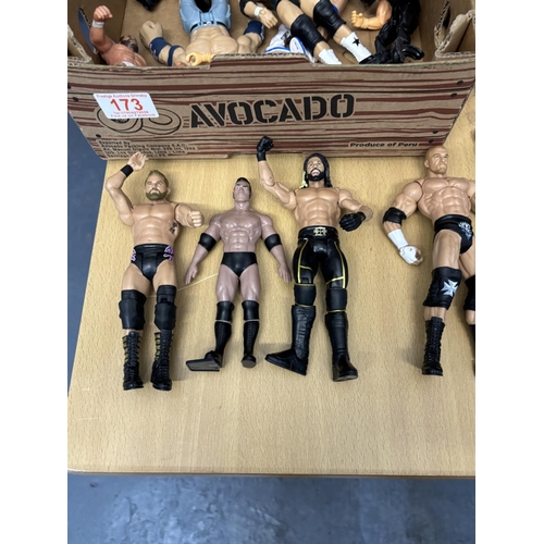 173 - BOX OF WRESTLING FIGURES INCLUDES BRETT THE HITMAN HEART, CANE, THE ROCK PLEASE SEE PICTURES FOR DET... 