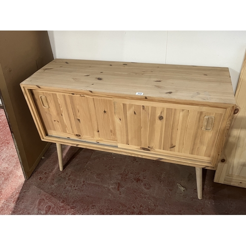 113 - SOLID PINE SIDEBOARD WITH SLIDING DOORS 49.5