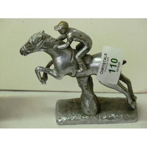 110 - A carved mascot in the form of a horse and jockey