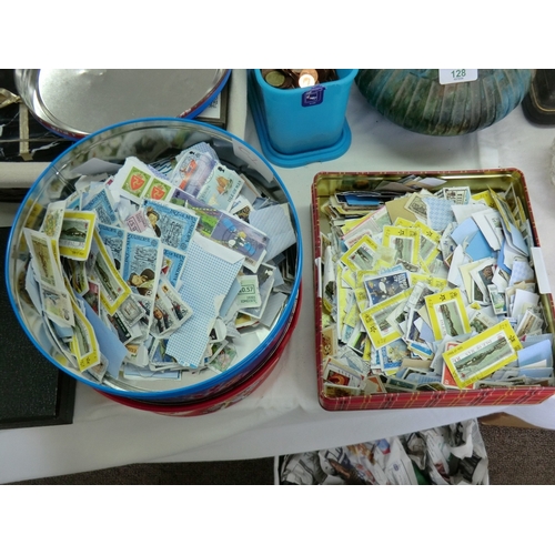 130 - Two tins of stamps