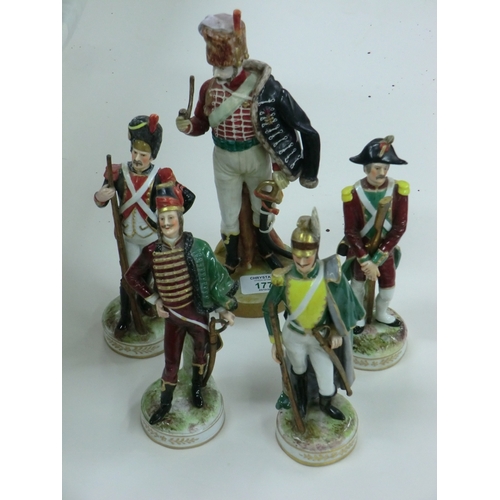 177 - Five porcelain figures of Napoleon's special troops - tallest 10 ins.