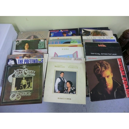 229 - Box of assorted LPs including Marc Bolan, Dire Straights, Eagles, etc.